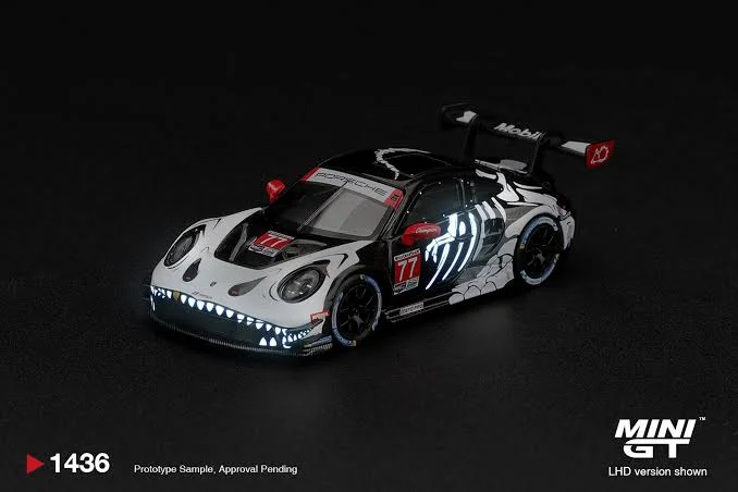 Mini GT Mini GT Porsche 911 GT3 R (992) #77 AO Racing Skeleton Rexy 2026 IMSA Petit Le Mans 1/64 Scale Diecast Model